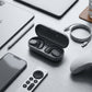 CTRL8 X29 open-ear headphones with charging case placed among tech accessories for a modern workspace setup