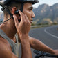Cyclist using CTRL8 VV4 Air Bone Conduction Neckband for outdoor music and calls during a ride